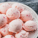 strawberry fat bombs on white plate