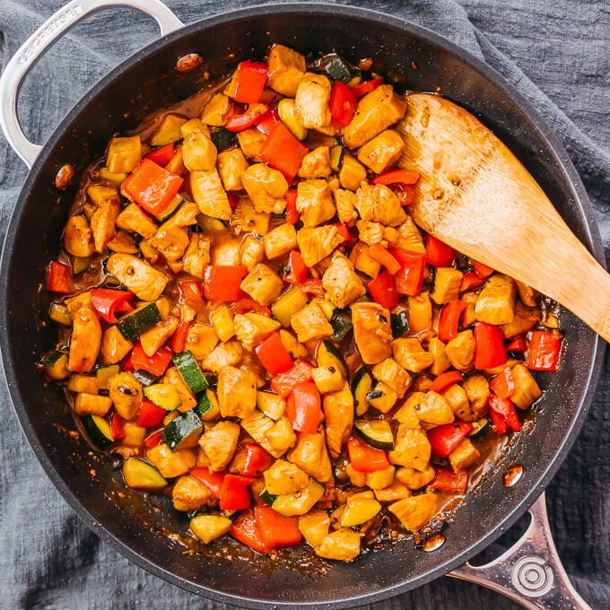 kung pao chicken with spicy sauce cooked on a pan