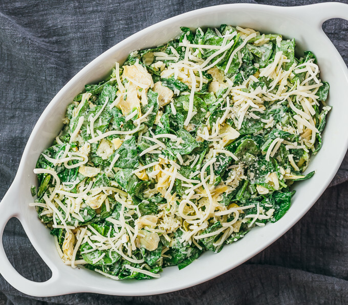 spinach artichoke mixture in baking dish