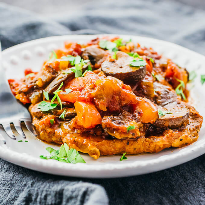 swiss steak served on white plate