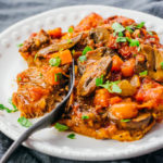 cutting into swiss steak