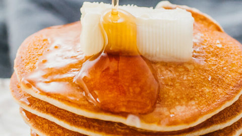 pancakes drizzled with syrup