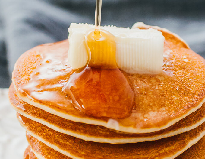 pancakes drizzled with syrup