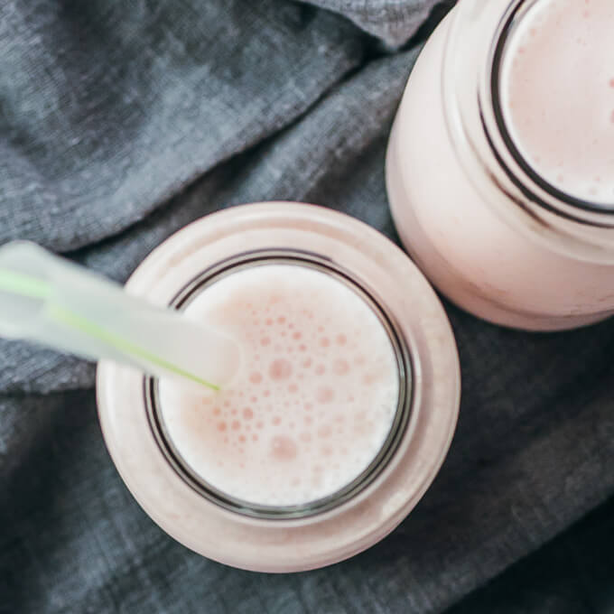 overhead view of raspberry smoothies