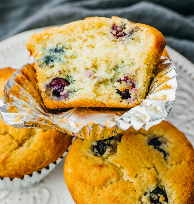 close up view of keto blueberry muffin partially eaten