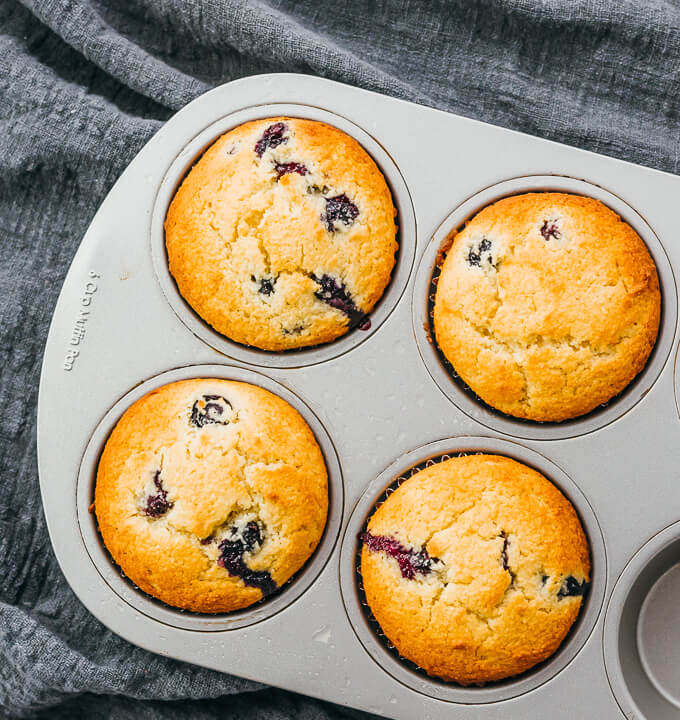 newly baked blueberry muffins in pan
