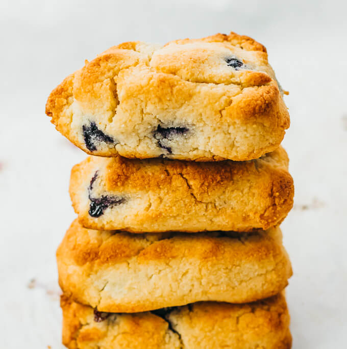 tall stack of low carb scones with blueberry
