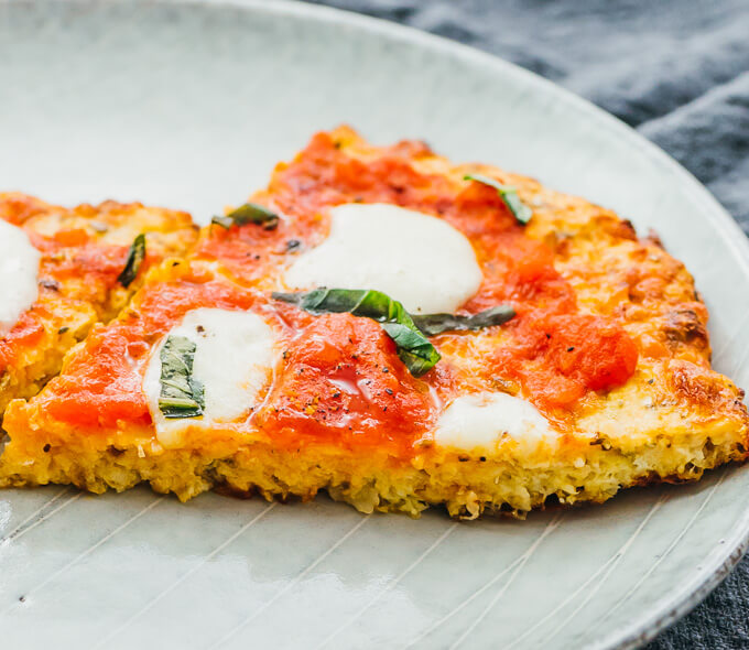 close up view of cauliflower crust pizza slices