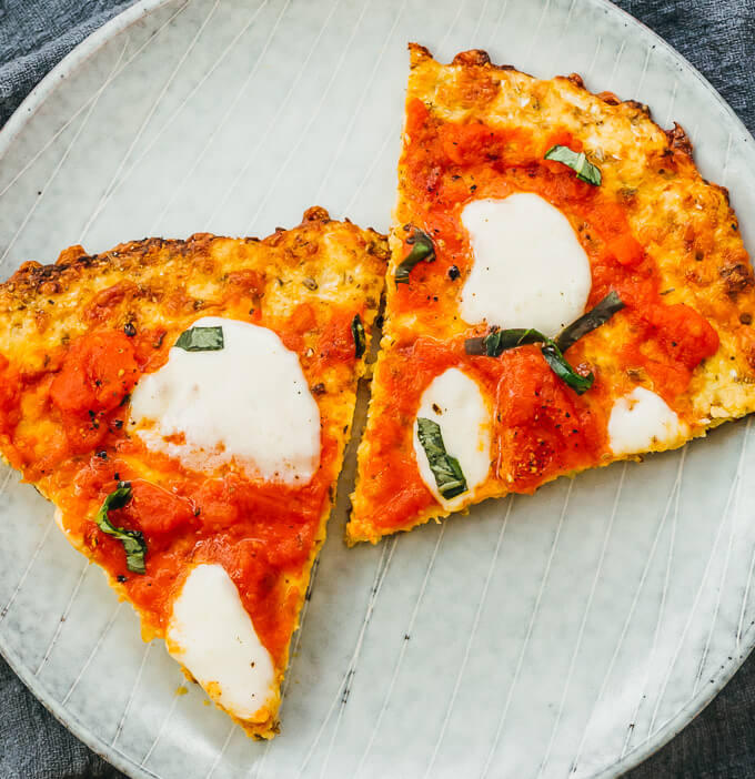 overhead view of cauliflower pizza slices