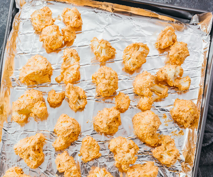 cauliflower florets on baking sheet