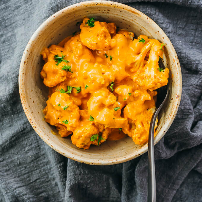 cauliflower curry served in stoneware bowl