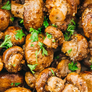 close up view of garlic roasted mushrooms