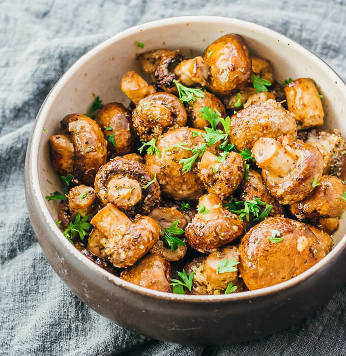 garlic roasted mushrooms in serving bowl