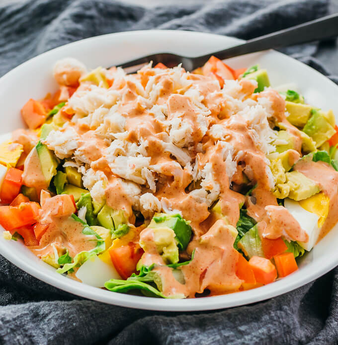 crab louie salad served on white plate