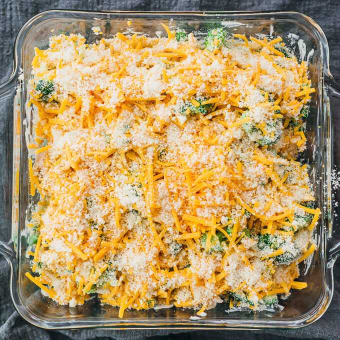 topping baking dish with cheeses