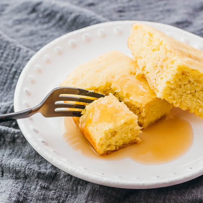 cutting a bite out of cornbread