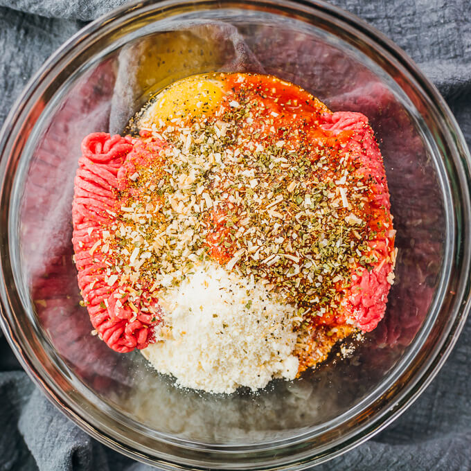 meatball ingredients in glass bowl