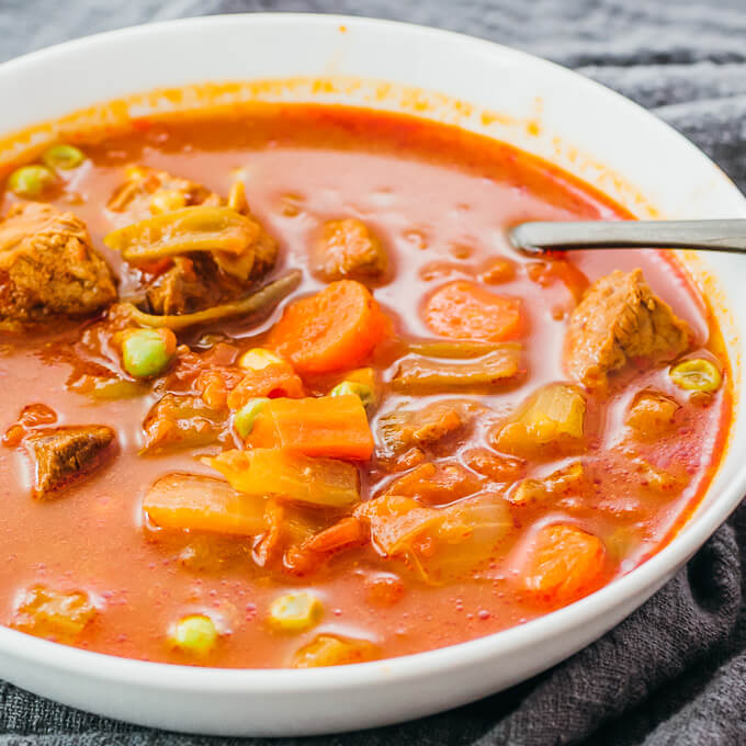 vegetable beef soup served in white bowl