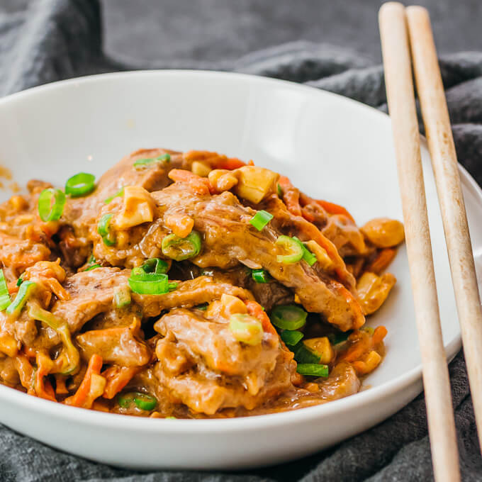 peanut beef stir fry served in white bowl