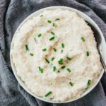 garlic mashed turnips served in white bowl