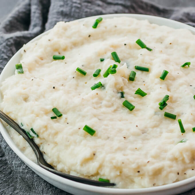 garlic mashed turnips served in white bowl