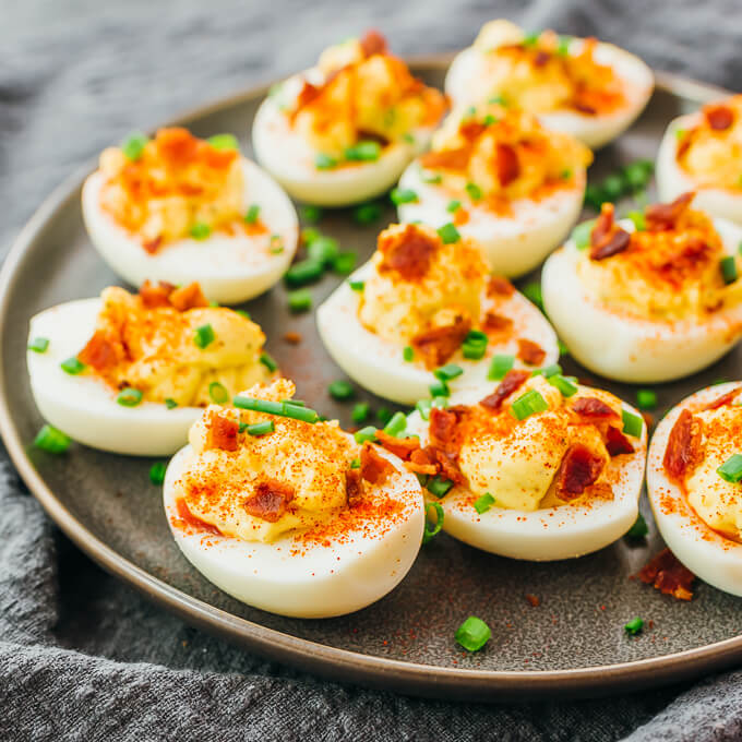 deviled eggs on gray platter