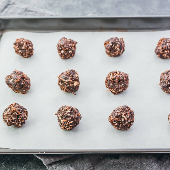 no bake cookie balls on parchment paper