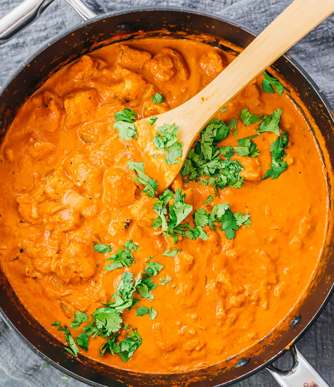 cooking butter chicken in pan