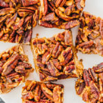 pecan bars served on white plate