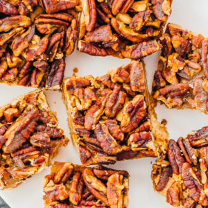 pecan bars served on white plate