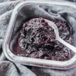 blueberry jam lifted up by spoon