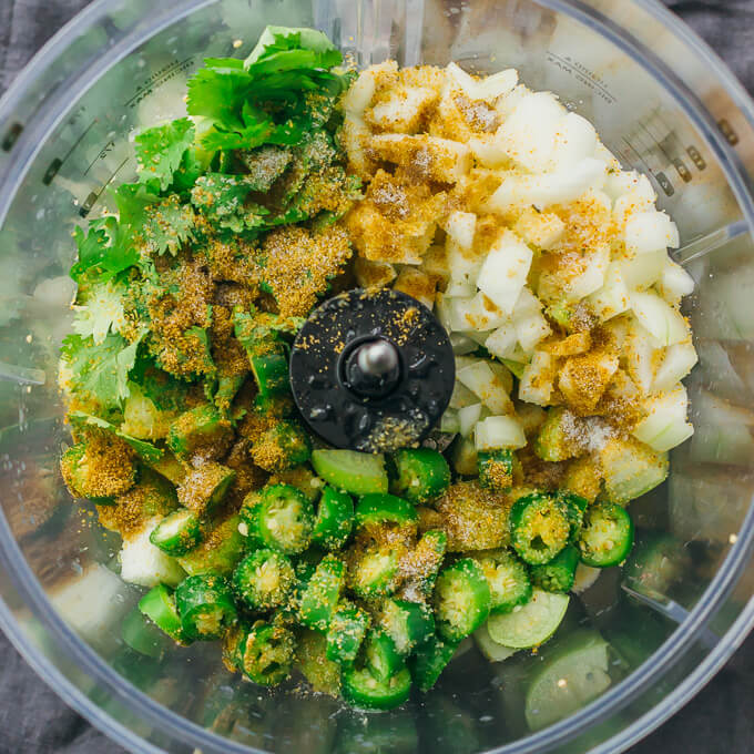 garlic, cumin, salt, and lime juice in food processor