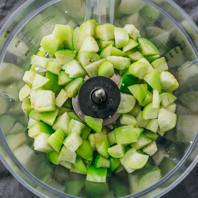 chopped tomatillos in food processor