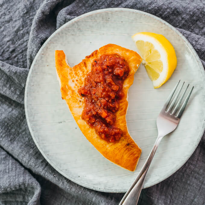 keto swordfish topped with salsa and lemon