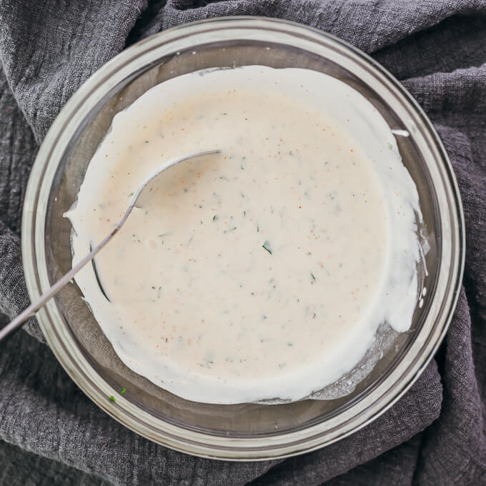 ranch dressing stirred in glass bowl