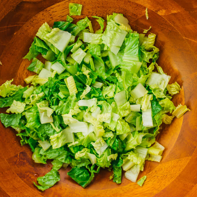 romaine lettuce in wooden bowl