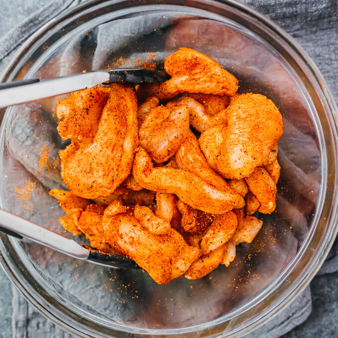 coating chicken with fajita seasonings