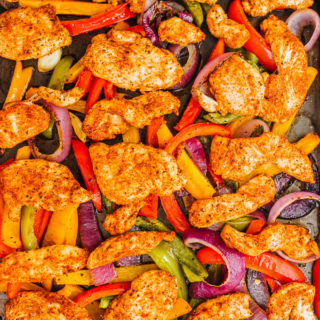 chicken fajitas on a baking sheet after baking
