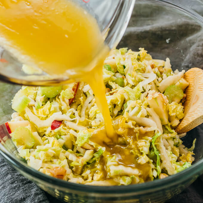 sherry vinaigrette poured over a cabbage salad