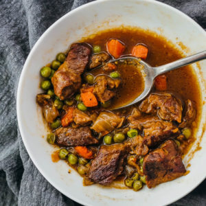 keto friendly lamb stew served in white bowl