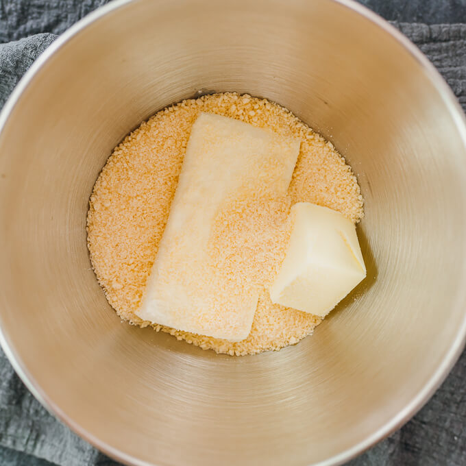 cream cheese, butter, parmesan cheese in mixer bowl