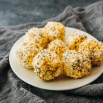 mini cheese balls served on white plate