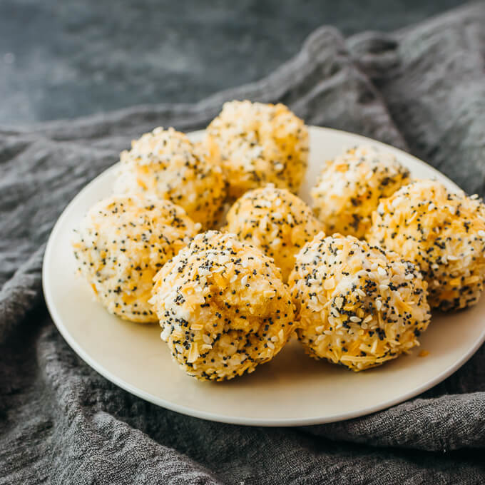 mini cheese balls served on white plate