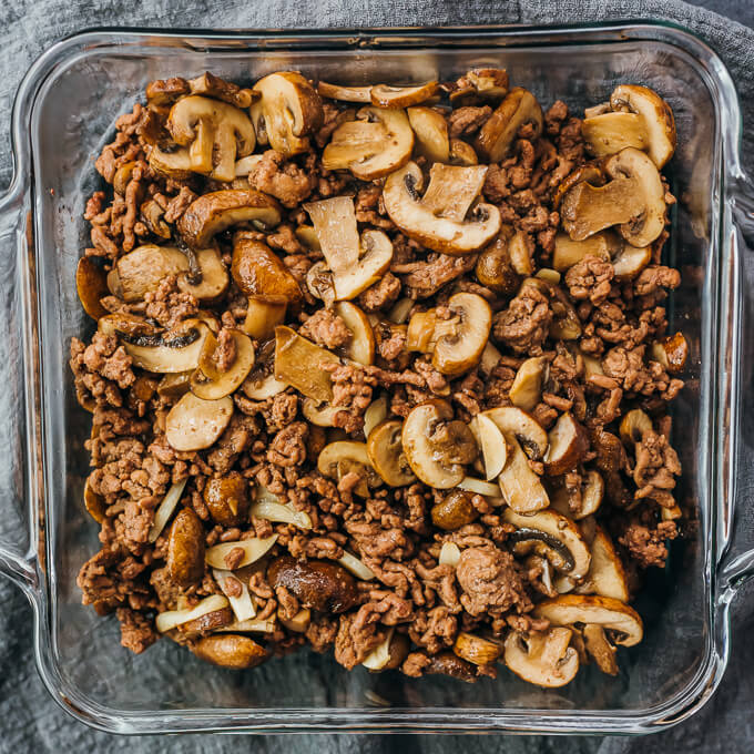 mushrooms and beef in casserole dish