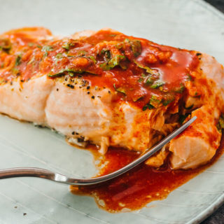 flaky tender salmon on a plate