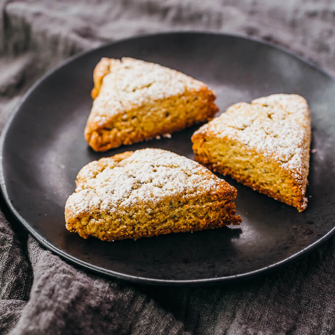 keto lemon poppy seed scones on black plate