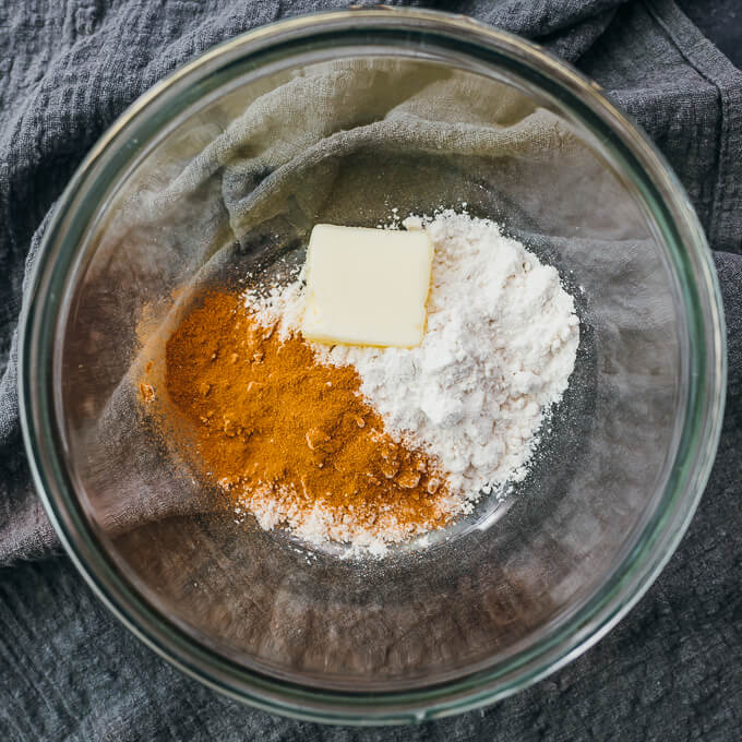 butter, cinnamon, and sweetener in bowl