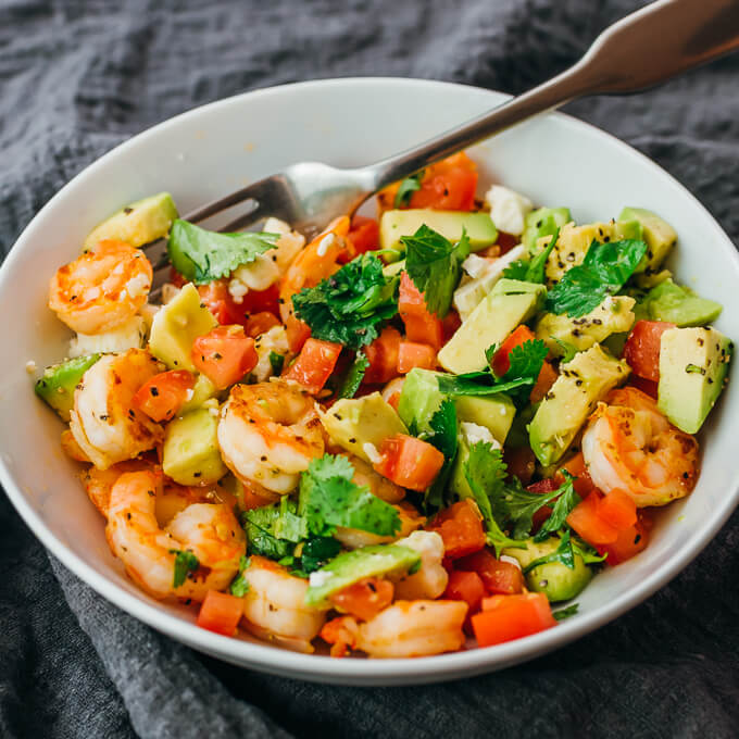 shrimp avocado salad in white bowl