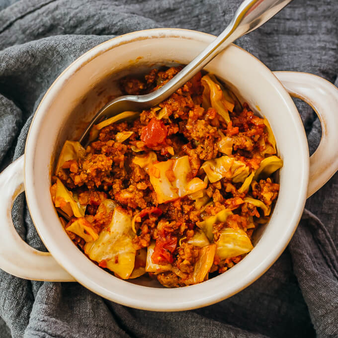 overhead view of unstuffed cabbage rolls in bowl