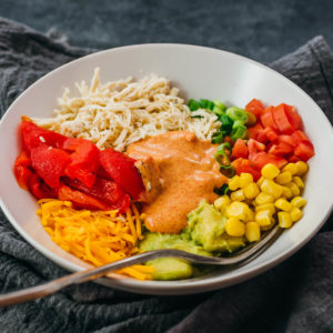 chicken burrito bowl with spicy mayo dressing